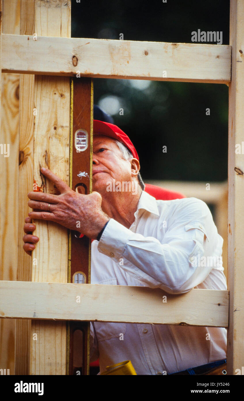 President Jimmy Carter volunteers at a Habitat for Humanity project in