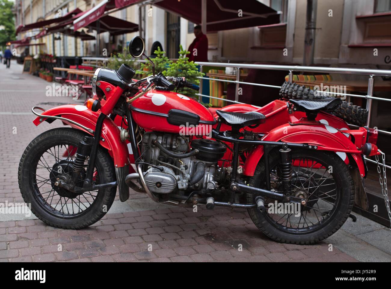 Red vintage IMZ-Ural motorbike with sidecar Stock Photo