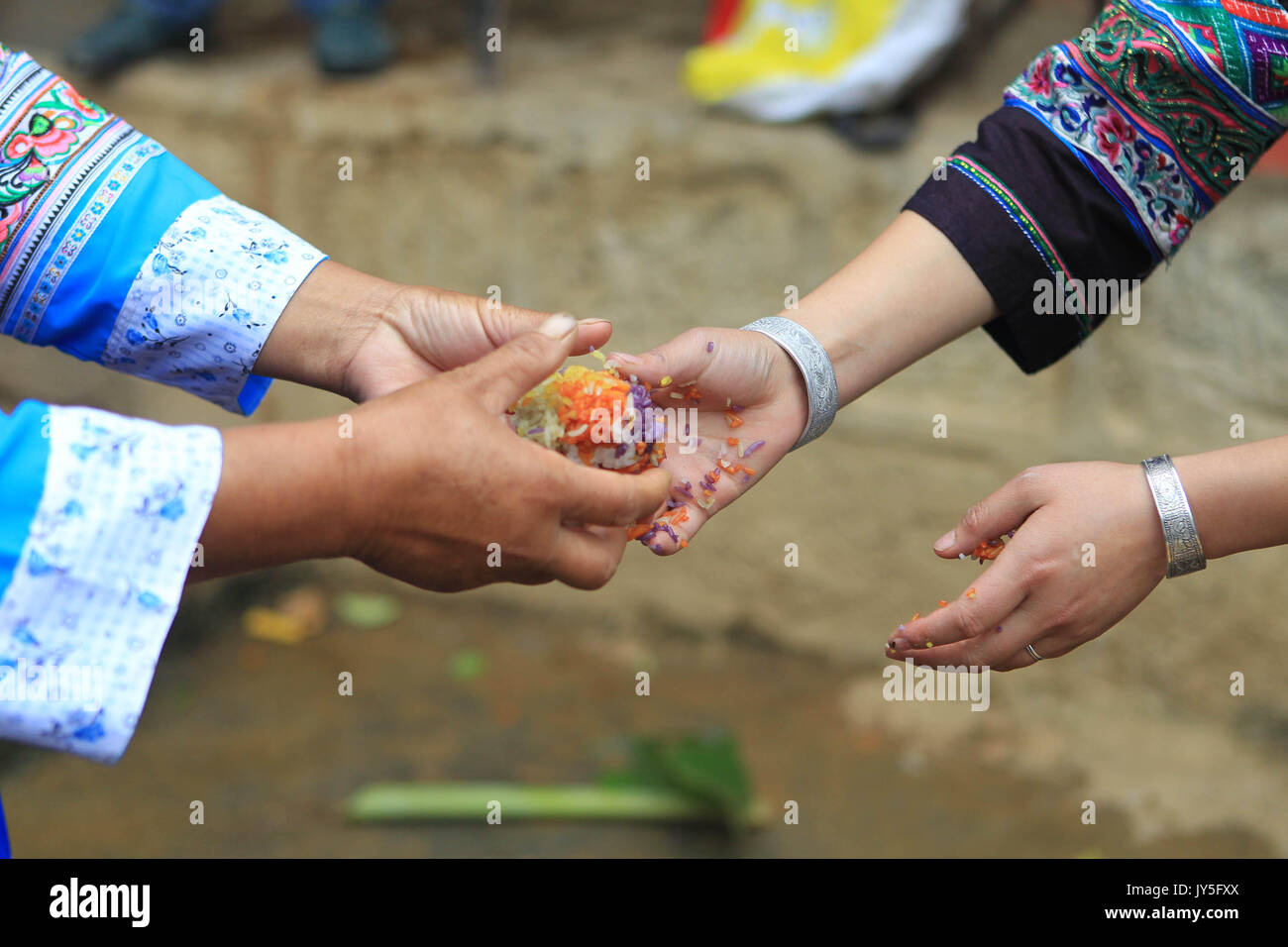 Qiubei, China's Yunnan Province. 17th Aug, 2017. Villagers exchange