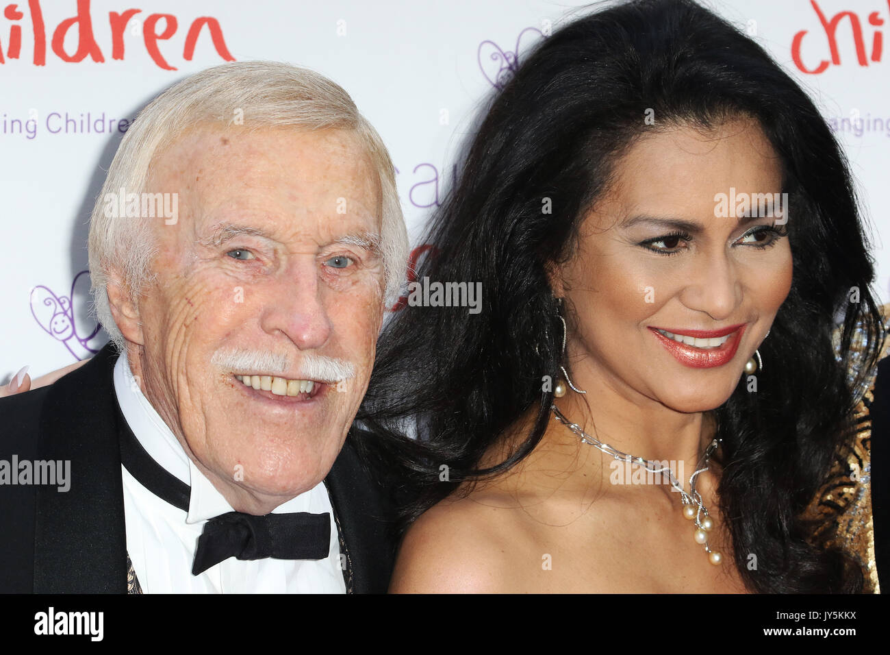 FILE PICS: Sir Bruce Forsyth, Lady Wilnelia Forsyth, Caudwell Children Butterfly Ball, Grosvenor House Hotel, London UK, 25 June 2015, Photo by Richard Goldschmidt Credit: Rich Gold/Alamy Live News Stock Photo