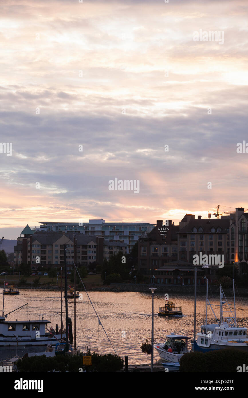 Water Taxi Taxi's in Victoria BC Harbour at sunset, Vancouver Island Stock Photo