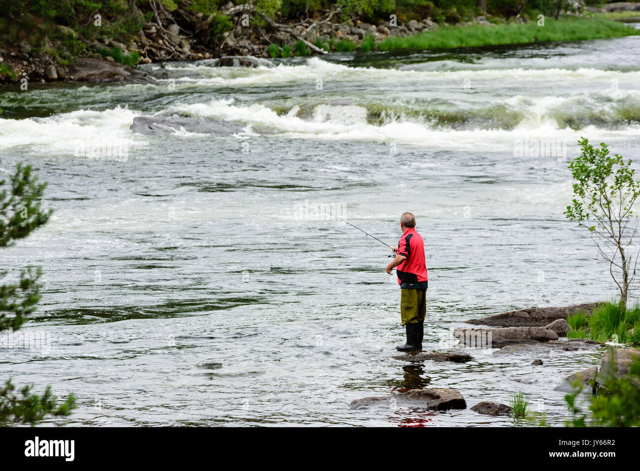 Byglandsfjord, Norway August 1, 2017 Travel documentary of man