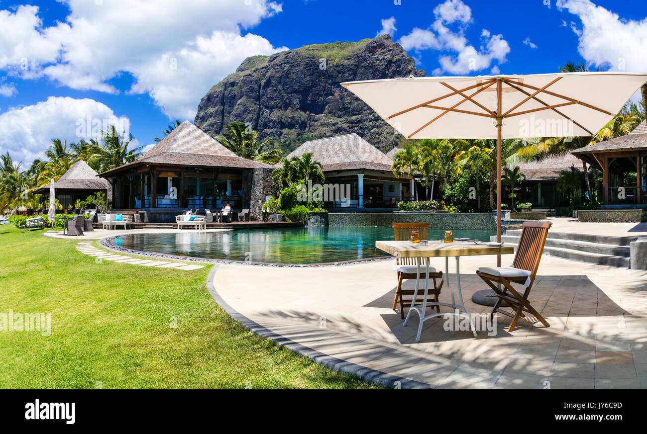 luxury vacation in Mauritius island. swim pool and lounge bar Stock Photo
