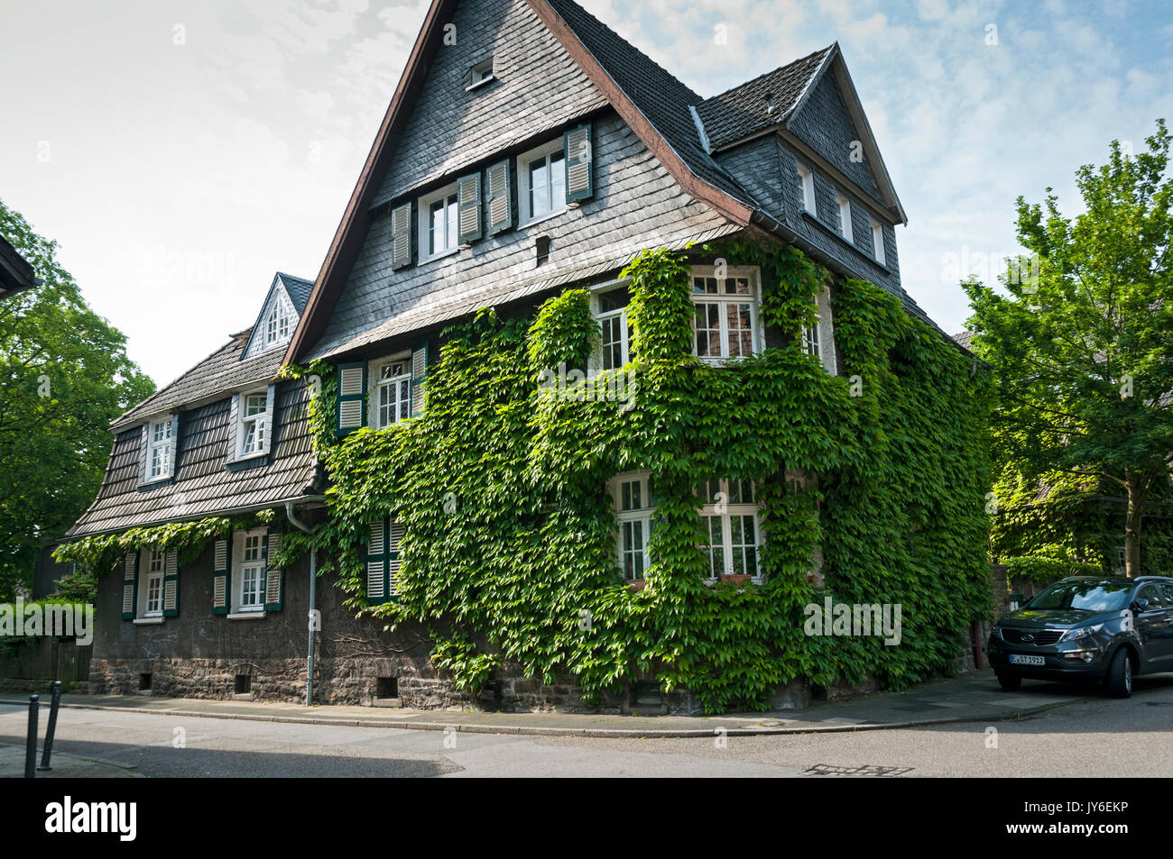 Margaretenhöhe, Essen, NRW, Germany. Ivy clad house.. Stock Photo