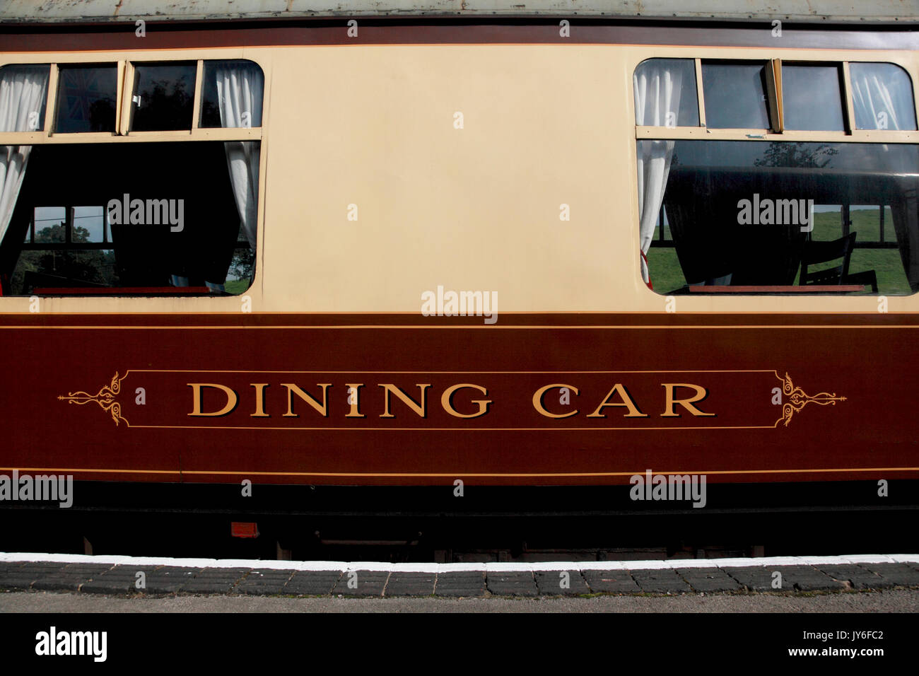 The dining car of what was a Pullman railway carriage now at Cheddleton station, home of Churnet Valley steam Railway Stock Photo