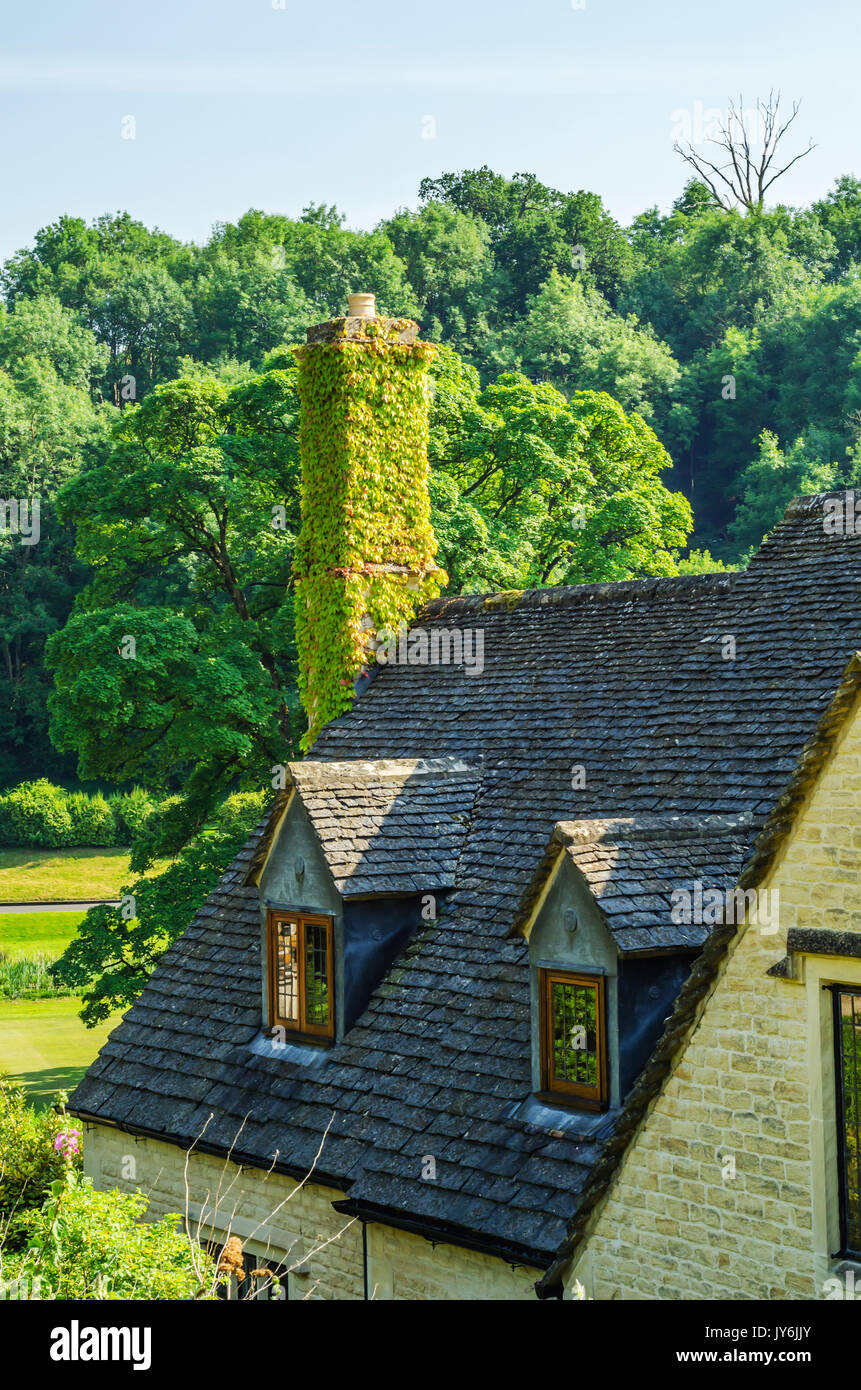 Roofs of buildings covered with sar roof tile, beautiful English  architecture, old roofs, vintage Stock Photo - Alamy