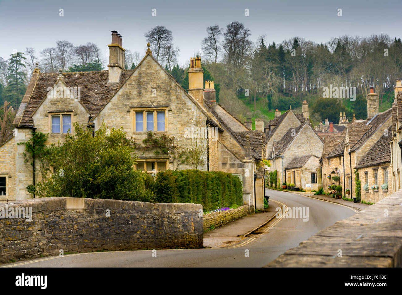 Typical Quaint Cottages Of The Village Of Castle Combe In The