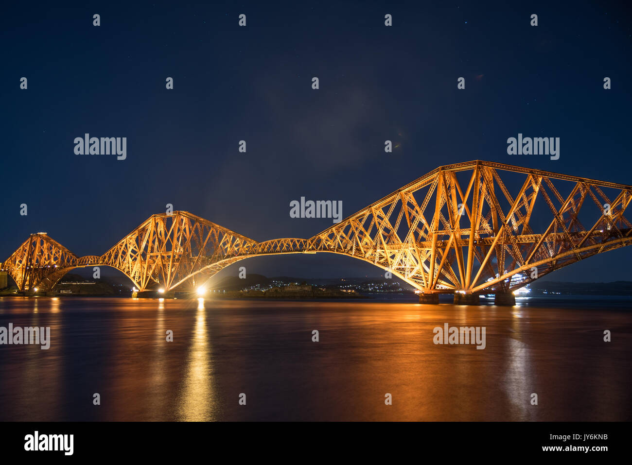 Night view of the Forth Rail Bridge in Edinburgh. The bridge that connects the scottish towns of North and South Queens ferry Stock Photo