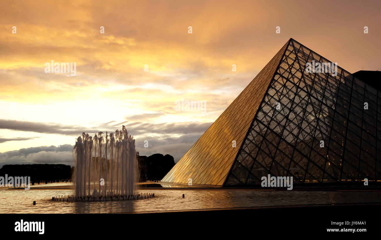 Sunset at Pyramide du Louvre, Paris Stock Photo