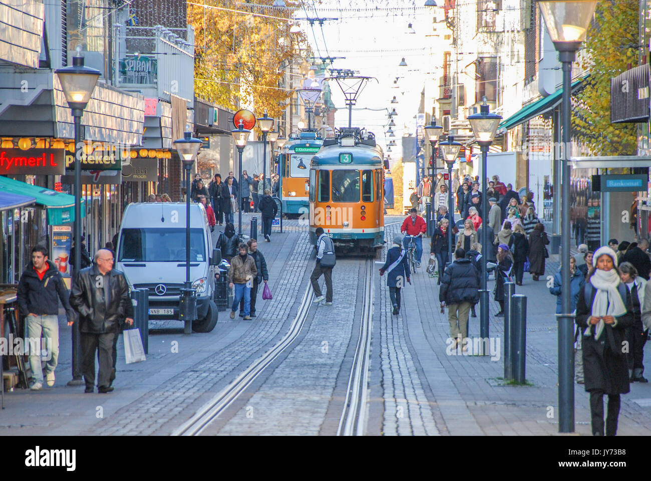 Tram in the city center of Norrkoping, Sweden. The yellow trams are