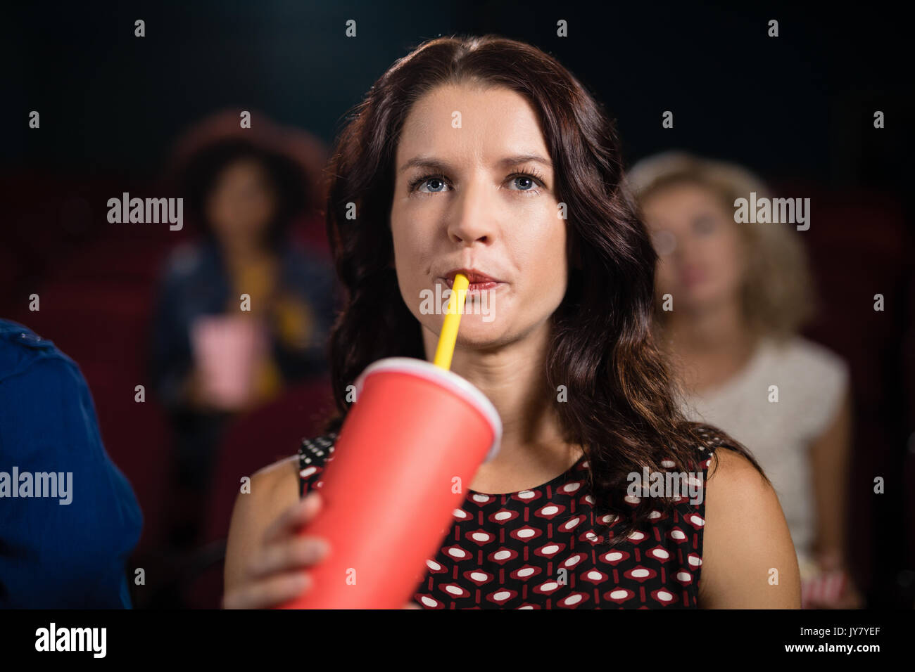 Woman watching movie hi-res stock photography and images - Alamy
