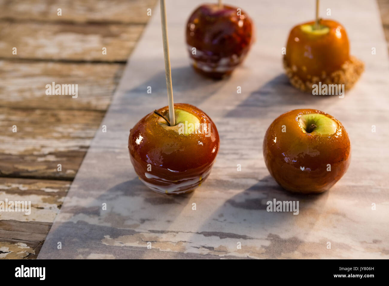 Close up of caramelized apple on table Stock Photo