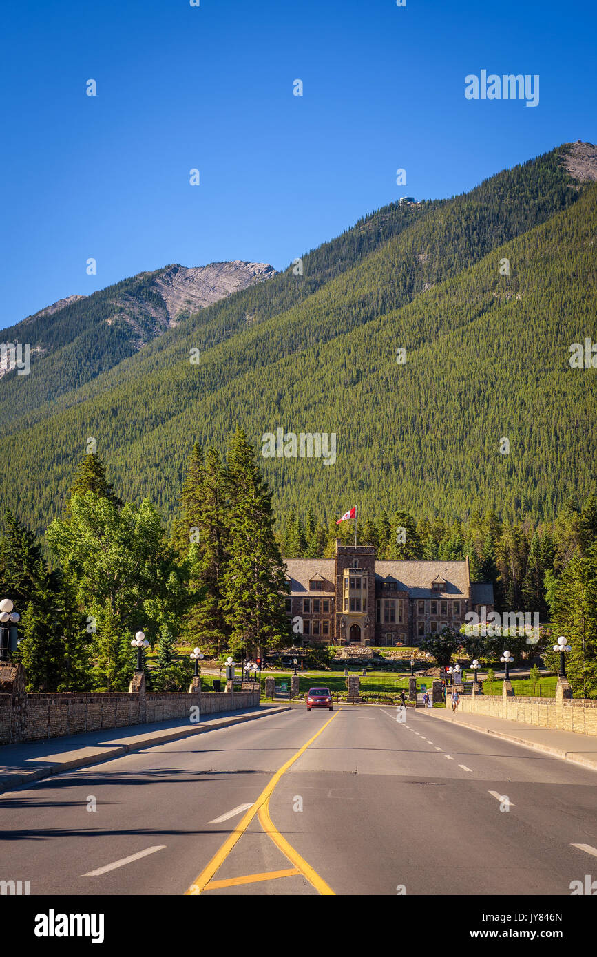 Scenic street view of the Banff Avenue and Parks Canada Administration Building in Cascade Gardens. Stock Photo