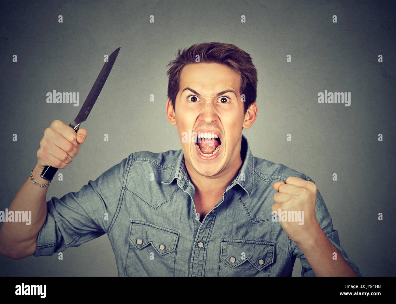 Angry man holding knife hires stock photography and images Alamy