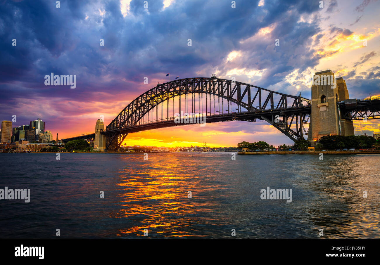 Dramatic sunset above Harbour Bridge in Sydney, NSW, Australia. Stock Photo