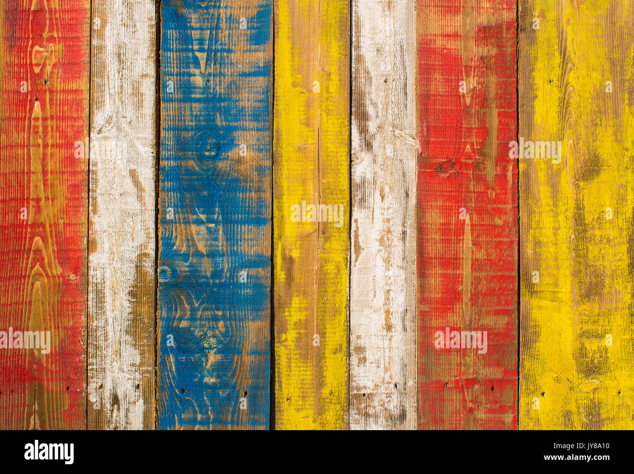 Multi coloured painted wooden panel strips  with distressed look. Stock Photo