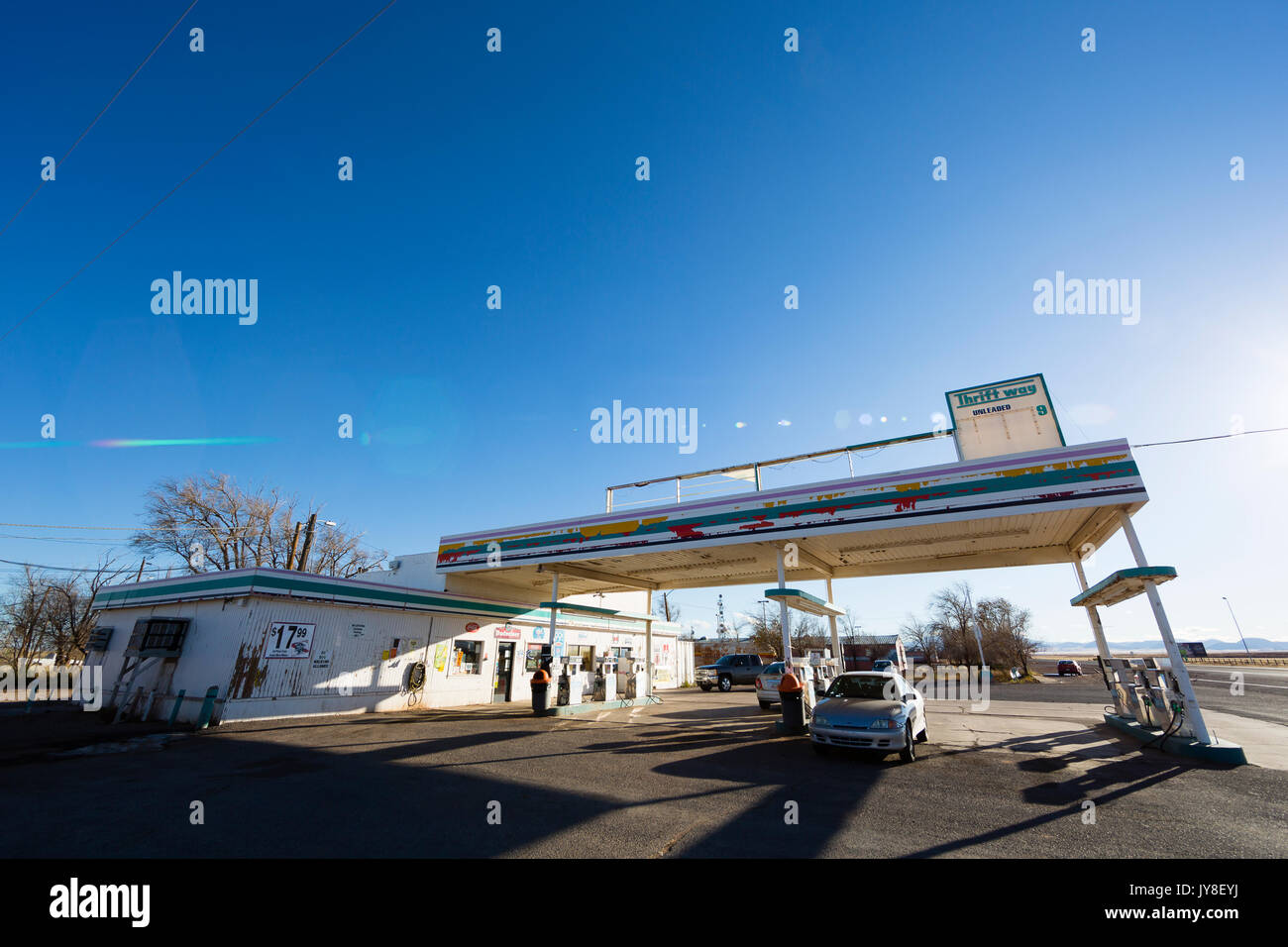 Utah, USA. A car sits under the awning of a gas station in the desert. Stock Photo