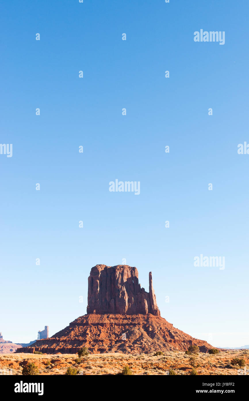 Monument Valley, Utah, USA. West Mitten Butte against blue sky. Stock Photo