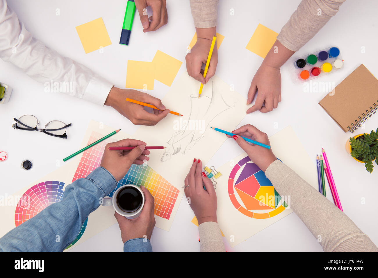 Concept of designer teamwork. Group of business people planning for a new project Stock Photo