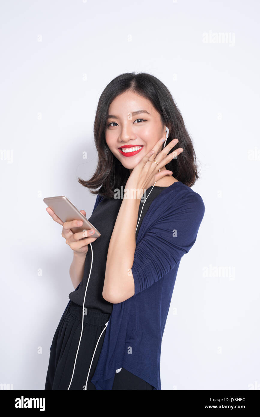 Young asian woman using smartphone isolated on white Stock Photo - Alamy