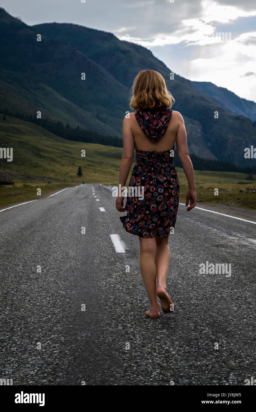 Barefoot woman hitchhiker hi-res stock photography and images - Alamy