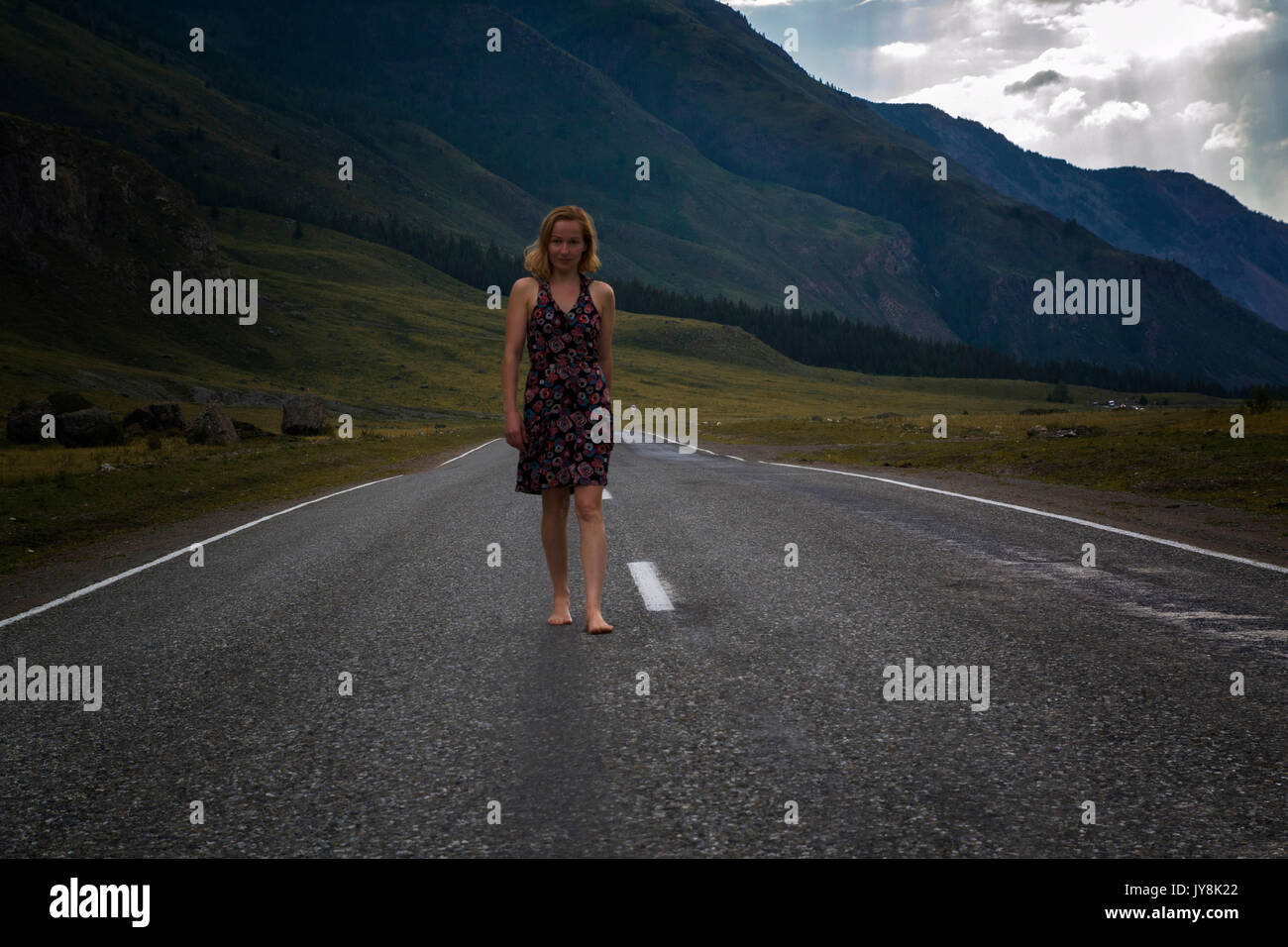 Barefoot woman hitchhiker hi-res stock photography and images - Alamy