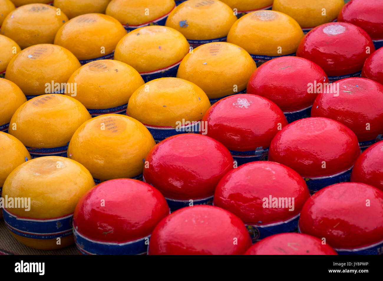 Red=waxed export cheese and yellow-waxed local cheese in Edam, Netherlands Stock Photo