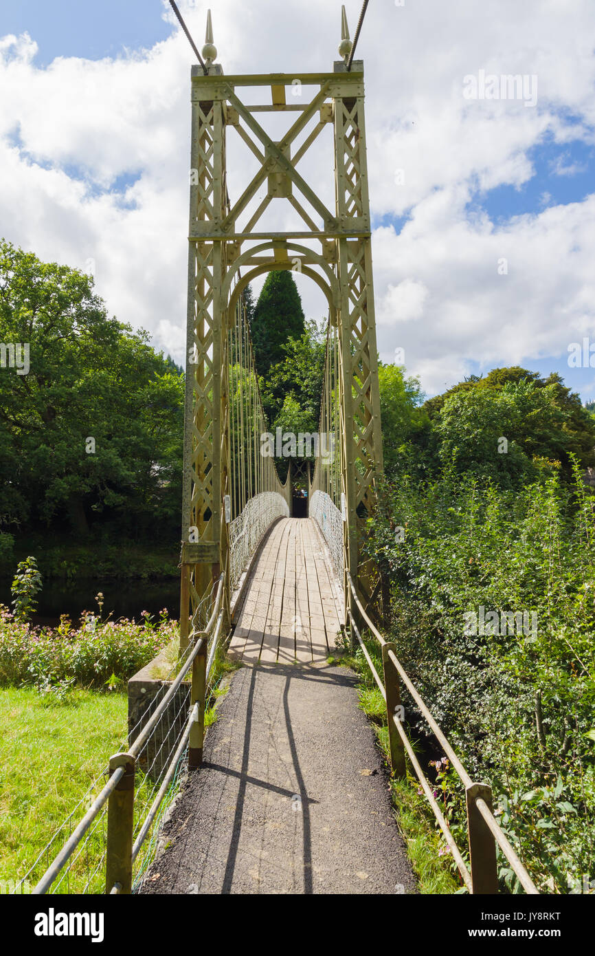 The Sappers suspension bridge over the River Conwy built in 1930 and a prominent landmark in the village of Betws-y-Coed in North Wales Stock Photo