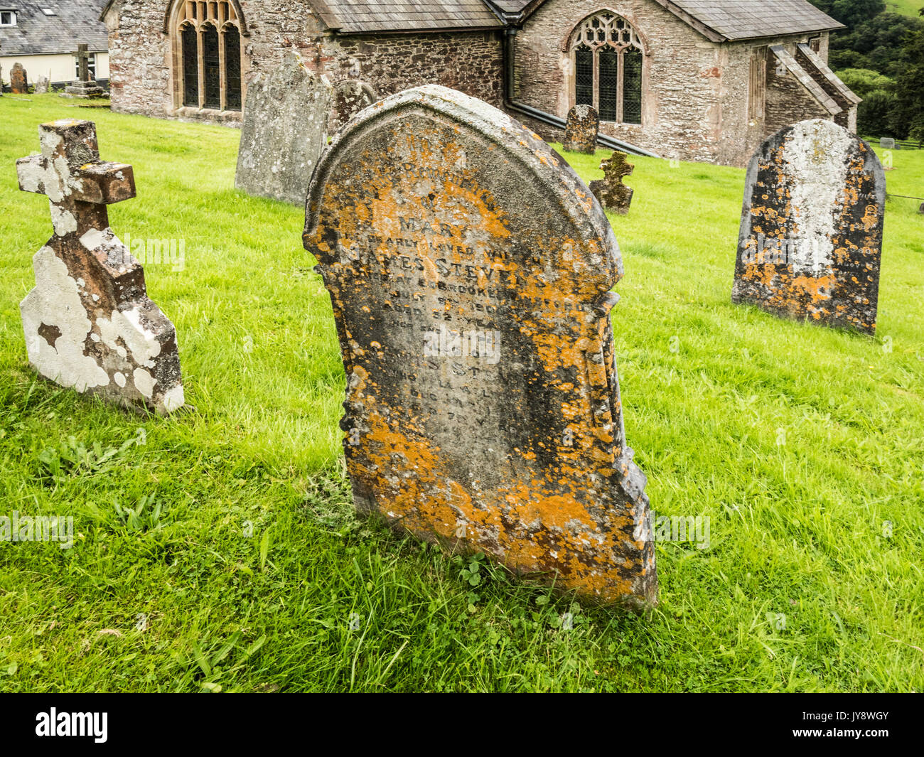 Gravestones in the churchyard of St.Peter's Church in Exton, Somerset. Stock Photo