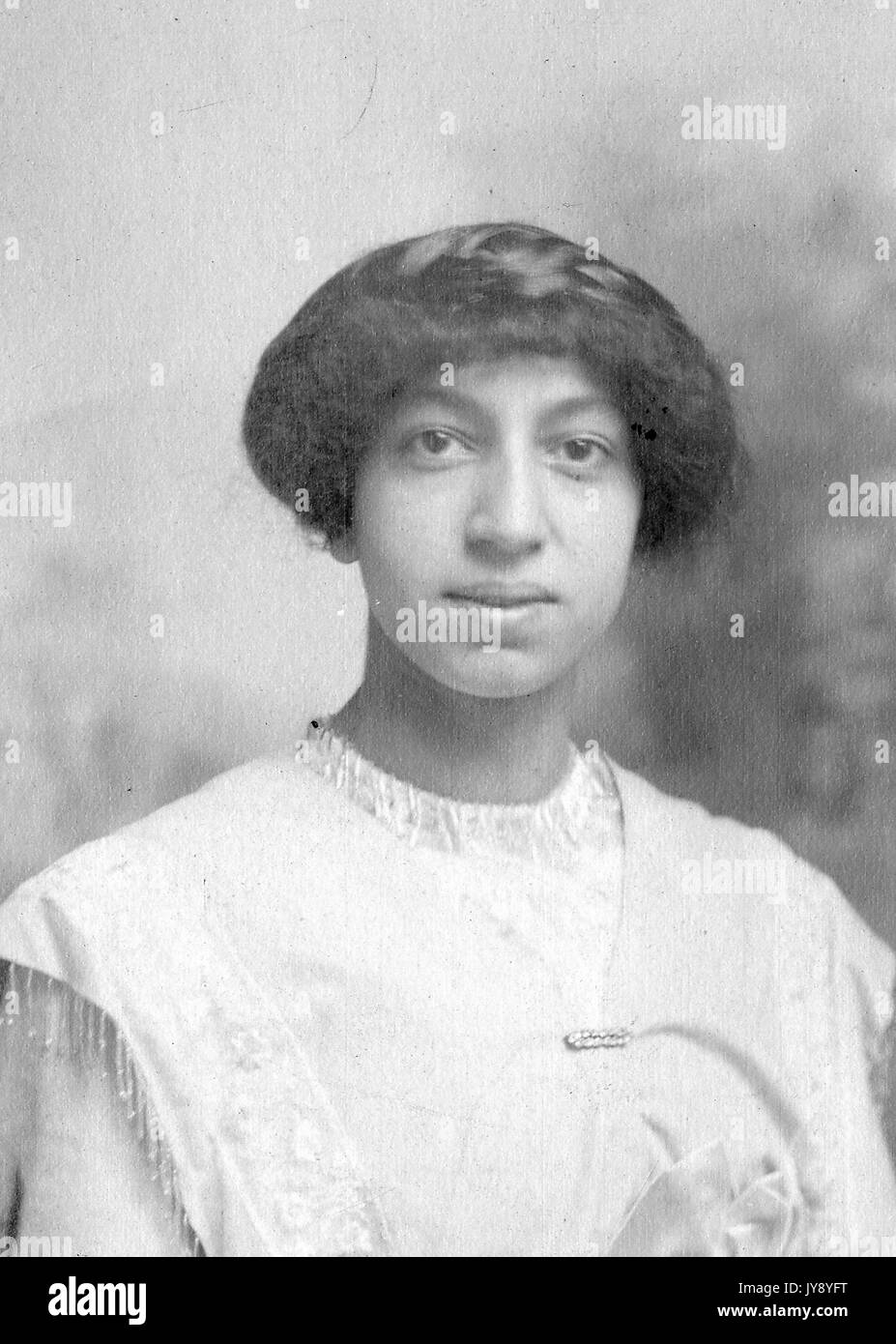 Headshot Portrait African American Woman Wearing White Top