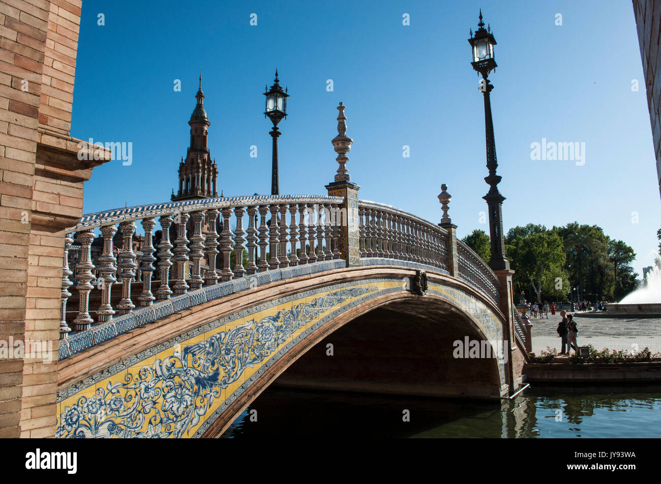 Spain: bridge of Plaza de Espana, the most famous square of Seville built in 1928 for the Ibero-American Exposition of 1929, with its navigable canal Stock Photo