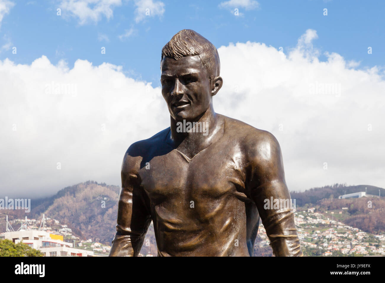 A statue of footballer Christiano Ronaldo is pictured on the Funchal waterfront on the Portuguese island of Madeira. Stock Photo