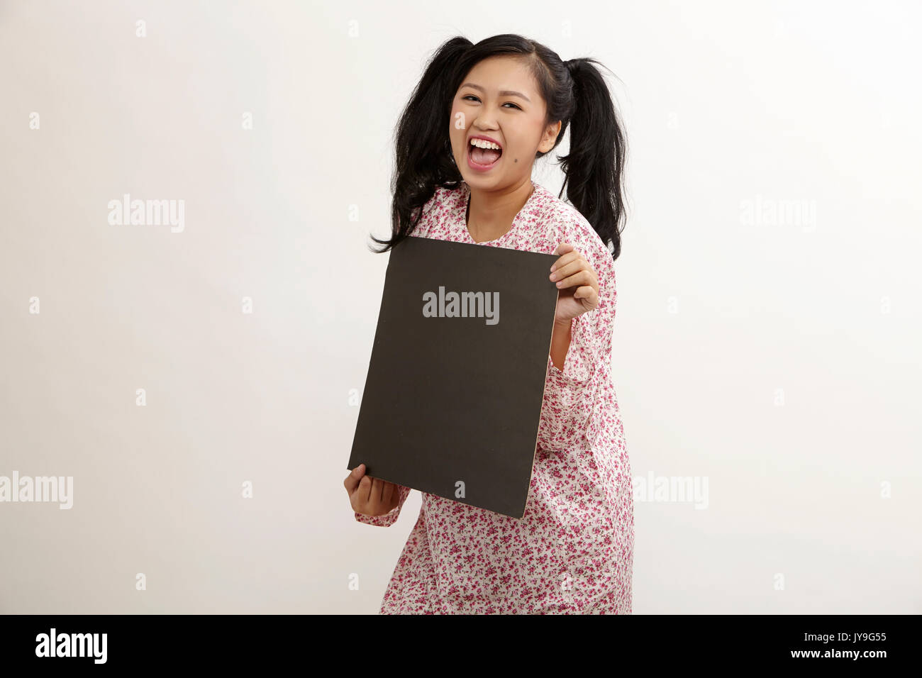 malay woman a holding placard Stock Photo Alamy