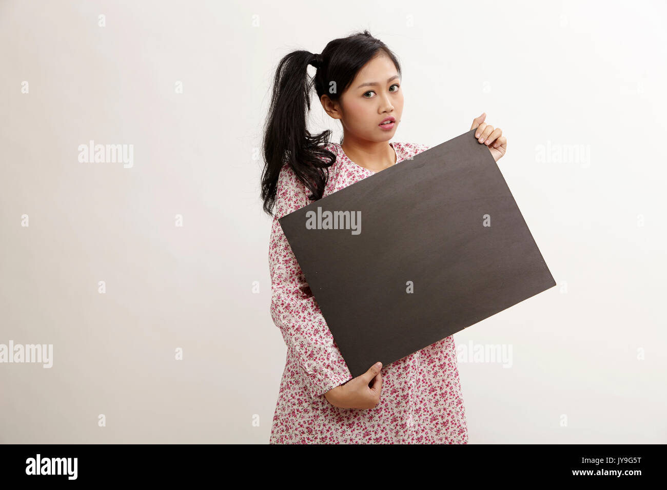 malay woman a holding placard Stock Photo Alamy