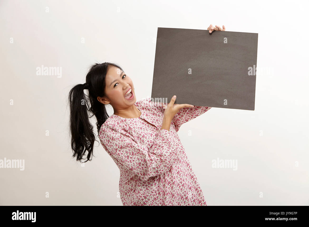 malay woman a holding placard Stock Photo Alamy