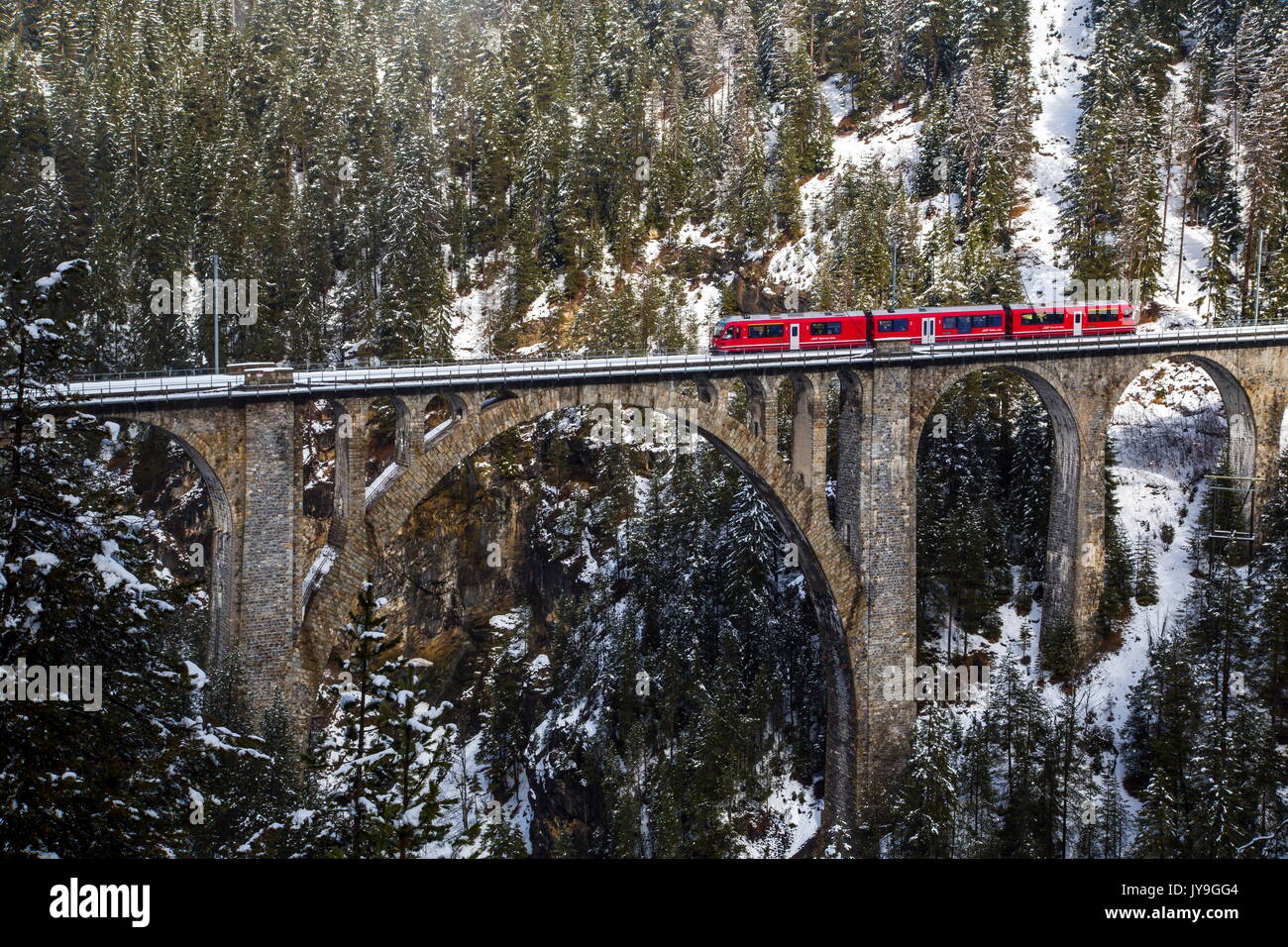 Bernina Express train, Engadine. Canton of Graubuenden. Switzerland. Europe. Stock Photo