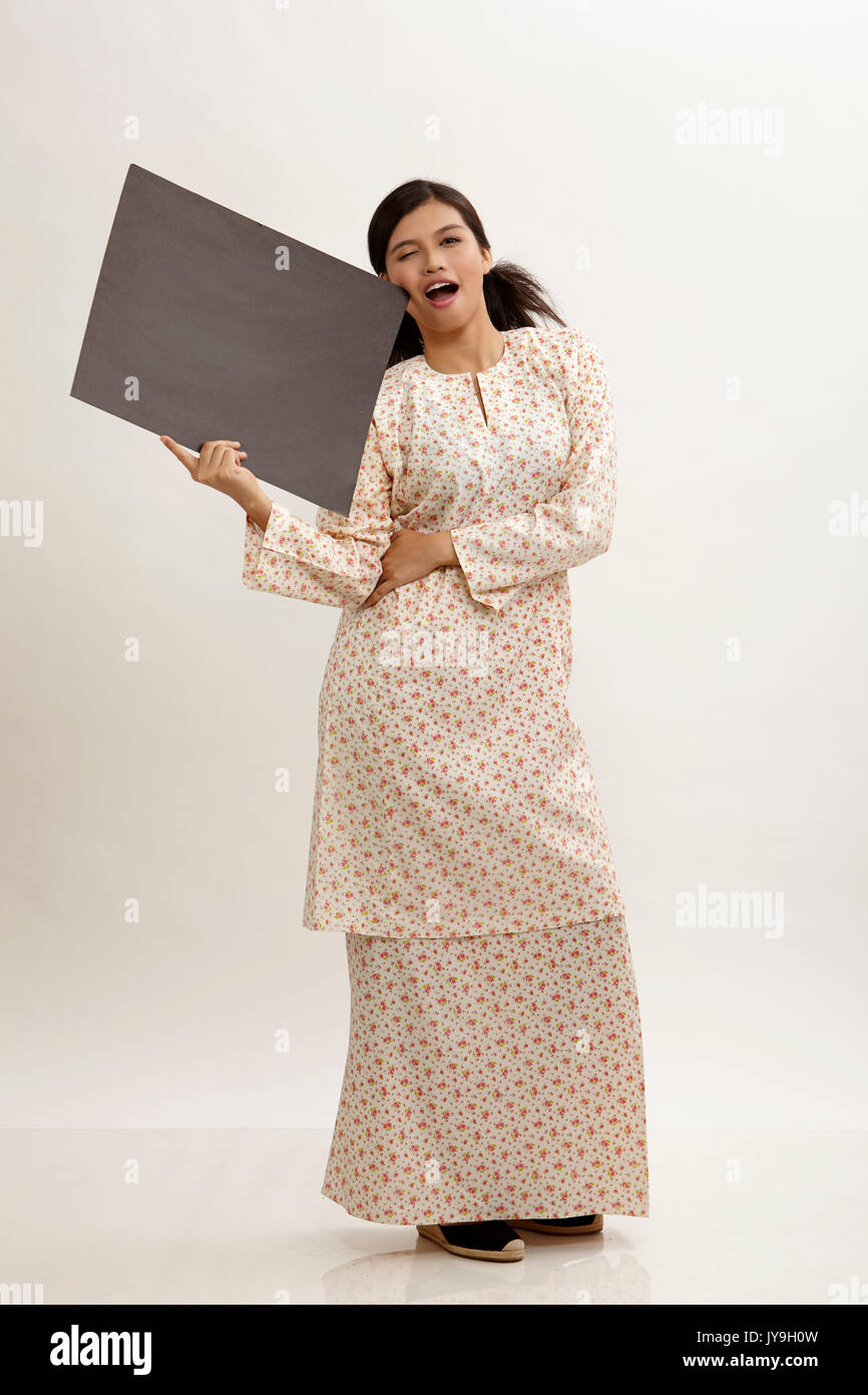 malay woman a holding placard Stock Photo Alamy