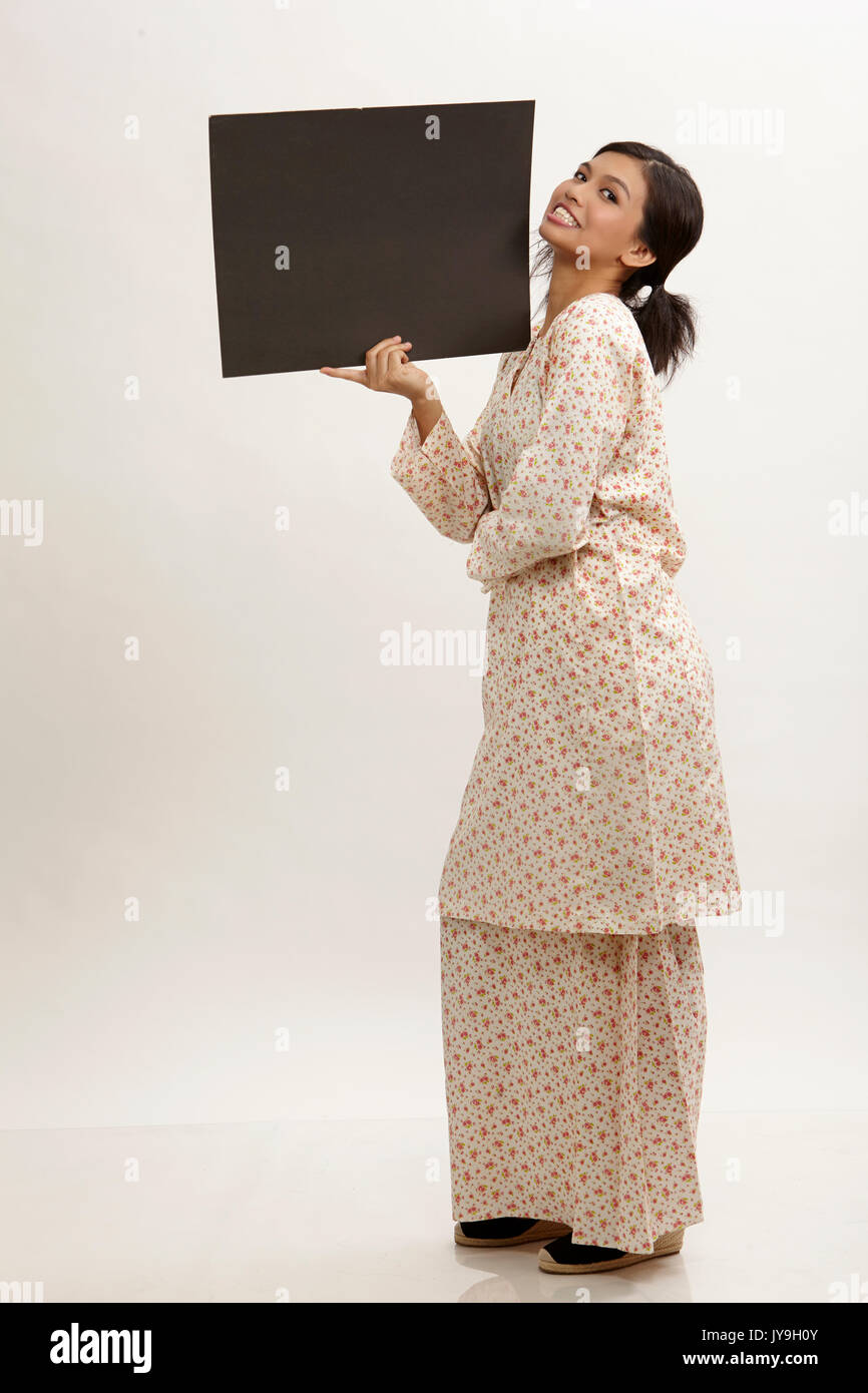 malay woman a holding placard Stock Photo Alamy