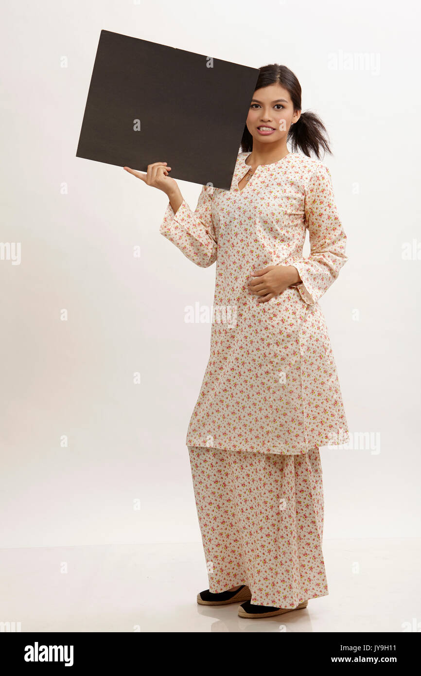 malay woman a holding placard Stock Photo Alamy