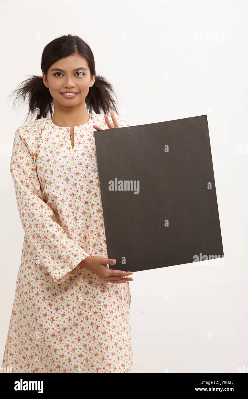malay woman a holding placard Stock Photo Alamy