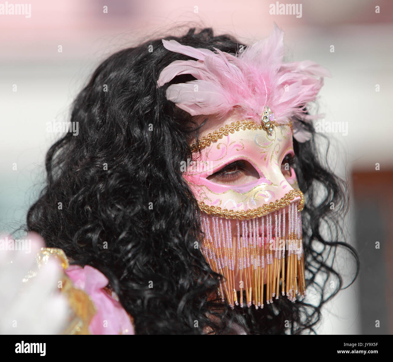 Venice,Italy-February 26th, 2011: Close-up of a woman wearing a Venetian disguise during the Carnival days.The Carnival of Venice (Carnevale di Venezi Stock Photo