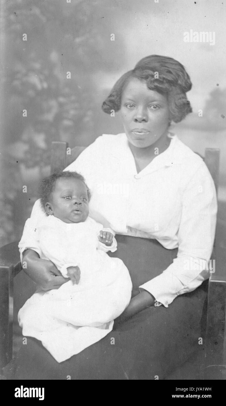 African woman holding infant Black and White Stock Photos & Images - Alamy