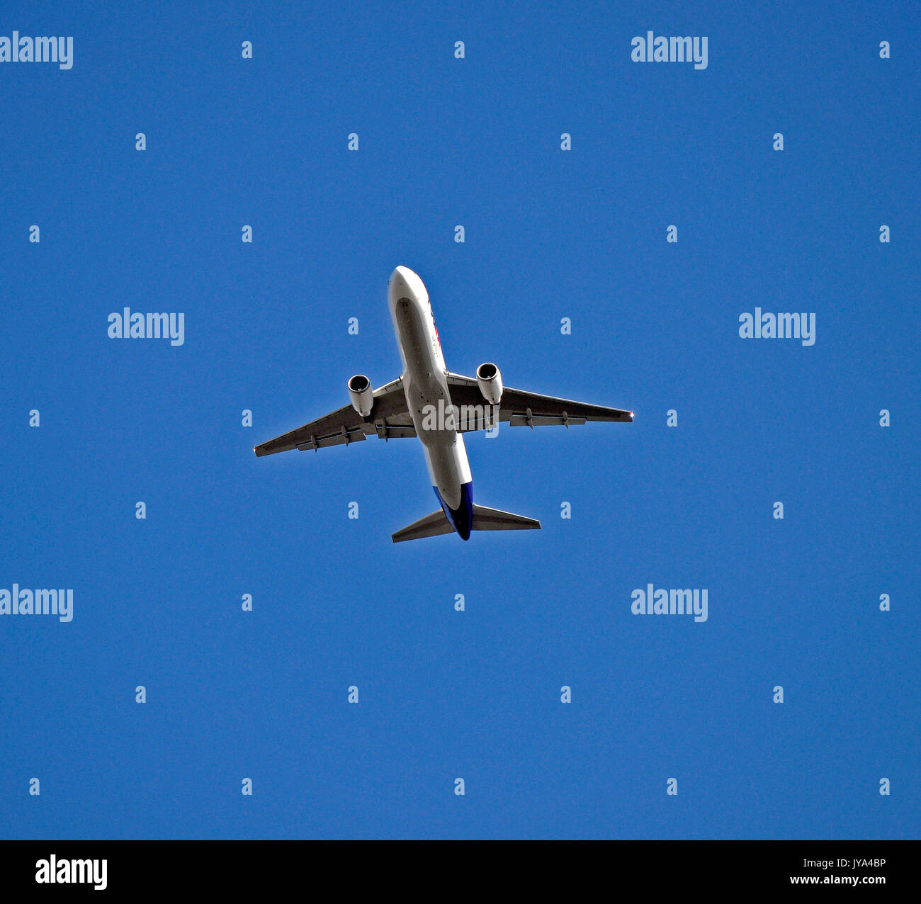 FedEx Express plane over Union City, California Stock Photo