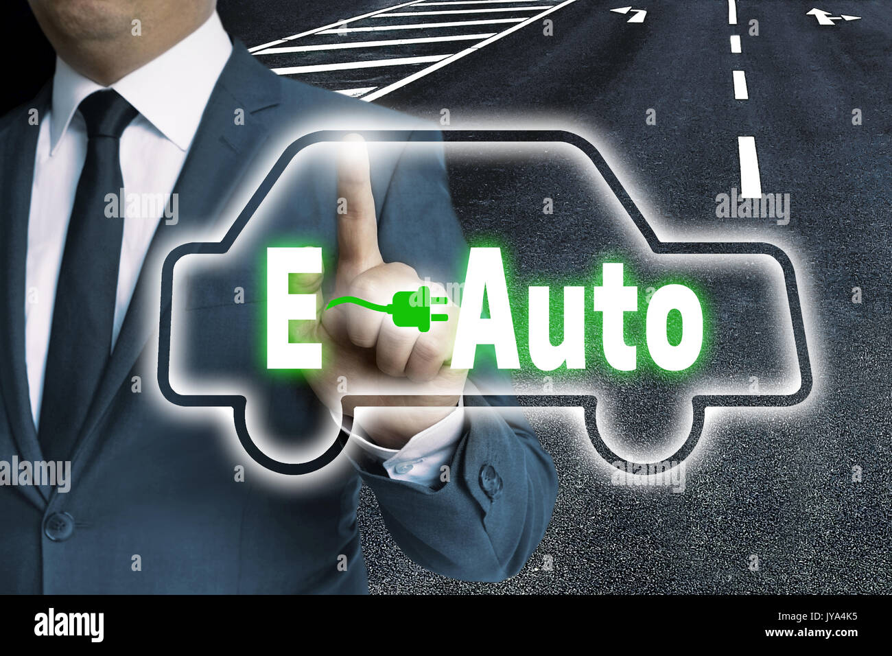 E-Auto touchscreen is operated by man. Stock Photo