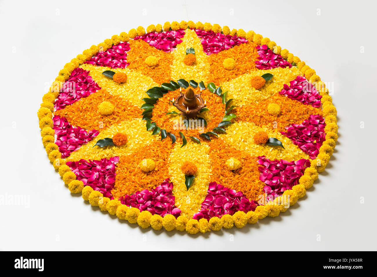 flower rangoli for Diwali or pongal or onam made using marigold or ...