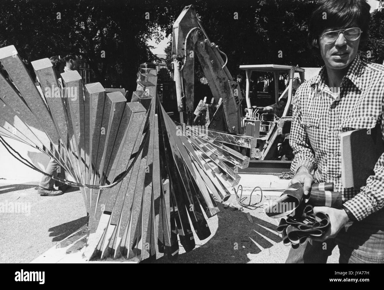 Construction of the centennial sculpture, created by sculptor David Brown to mark the one hundredth anniversary of the founding of Johns Hopkins University on the Homewood campus of the University in Baltimore, Maryland. 1976. Stock Photo
