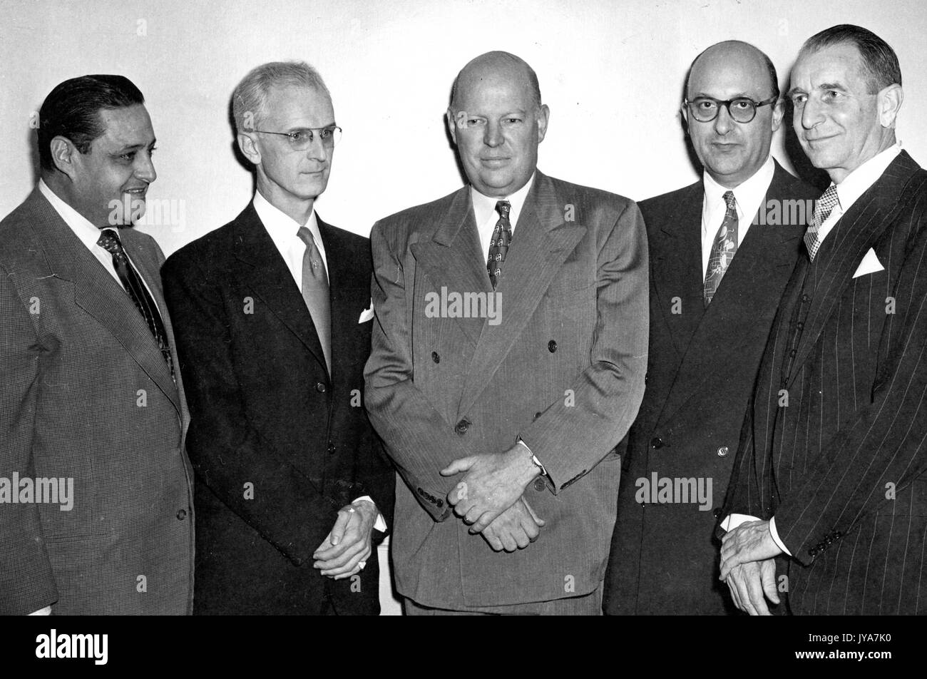 Norman K, American television host Lynn Poole, Dr Allen B DuMont, executive Ben Cohen, and magazine editor Edward Weeks are standing left to right for a group portrait, 1950. Stock Photo