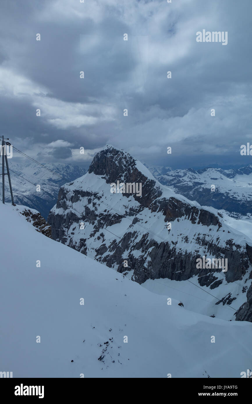 Snow-covered mountaintops in Switzerland Stock Photo