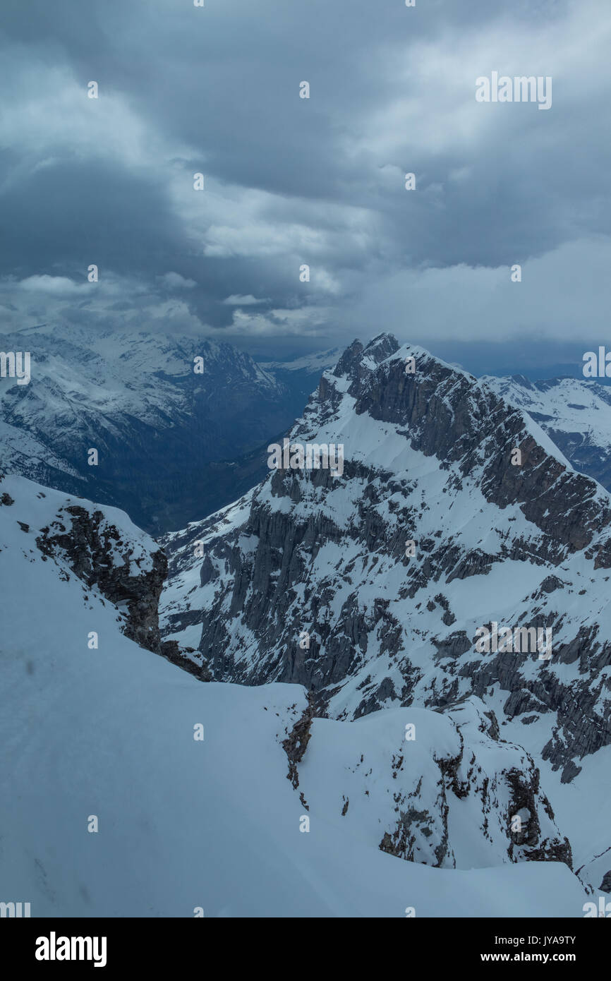 Snow-covered mountaintops in Switzerland Stock Photo