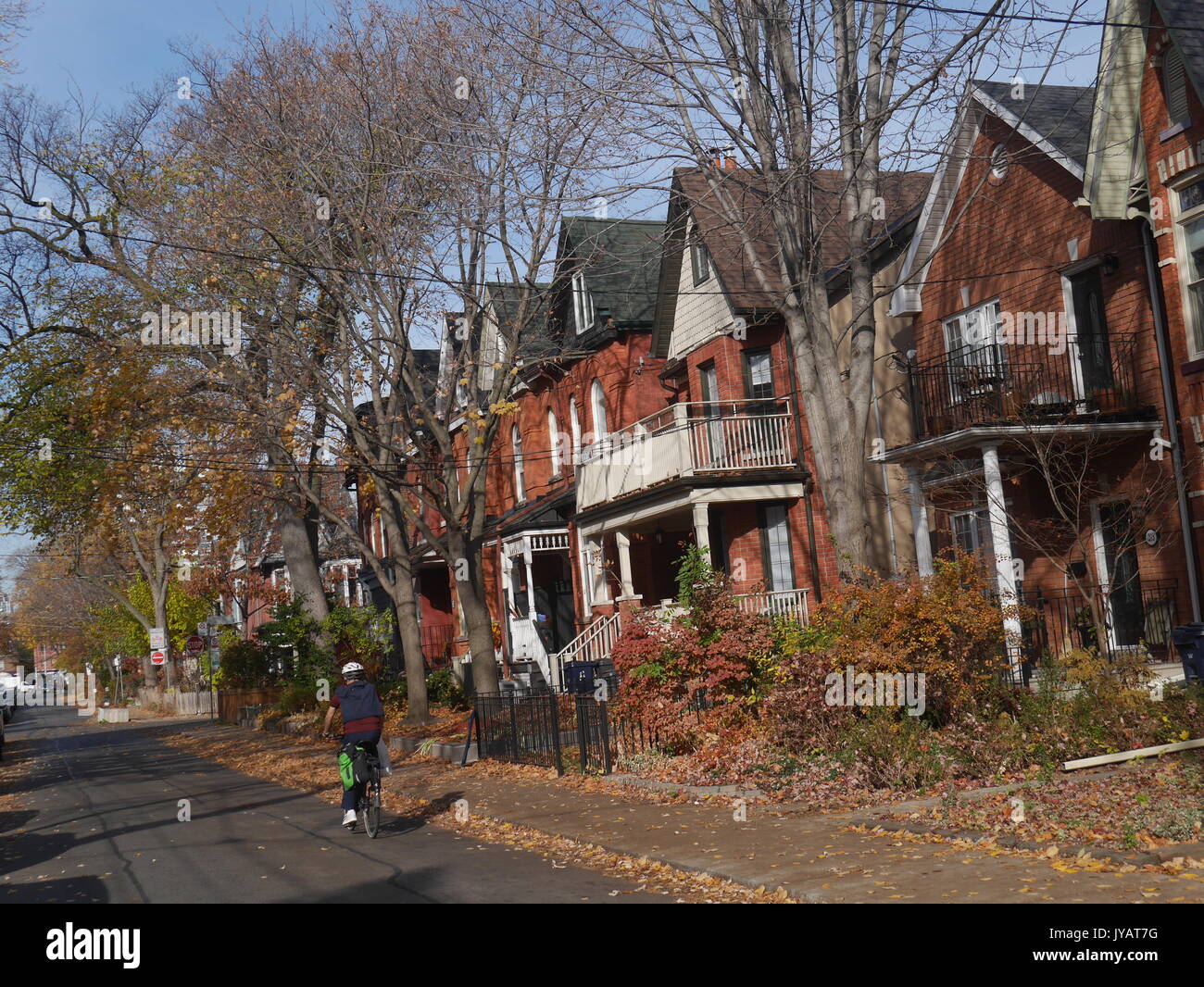 Victorian row of houses with gable roofs Stock Photo - Alamy